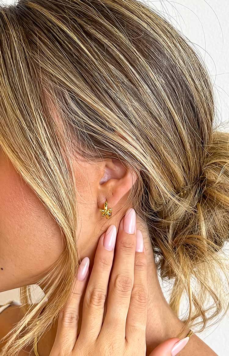 Darling Gold Bow Huggie Earrings (FREE over $100) Image