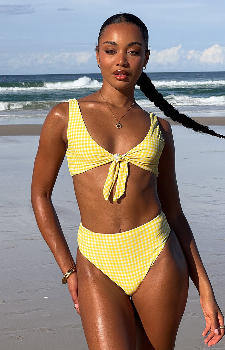 Yellow gingham high-waisted bikini bottoms with a high-cut leg