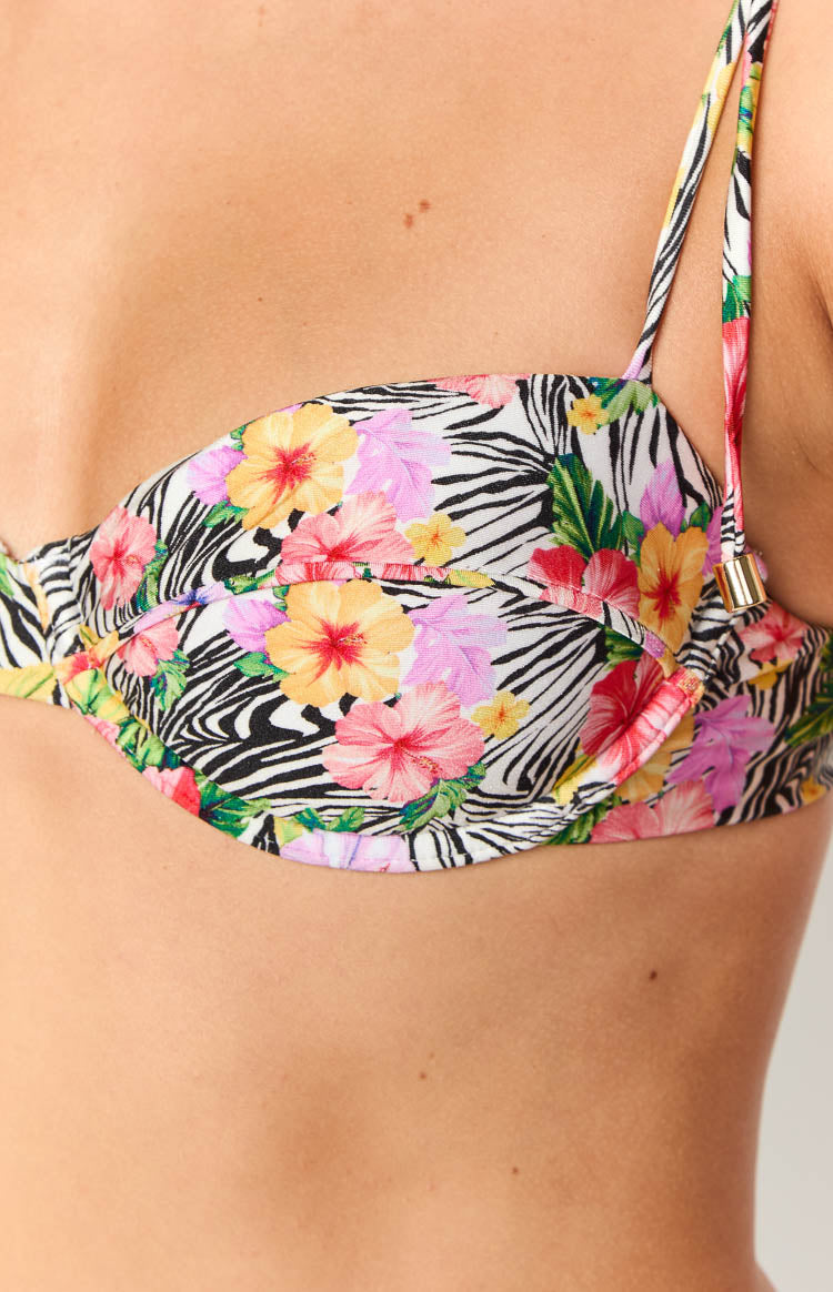 Close-up of the zebra and floral print underwire bikini top with a gold strap adjuster