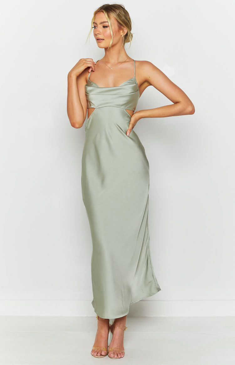 Sage silky maxi dress with a draped cowl neck, thin straps, and side cutouts with delicate trim