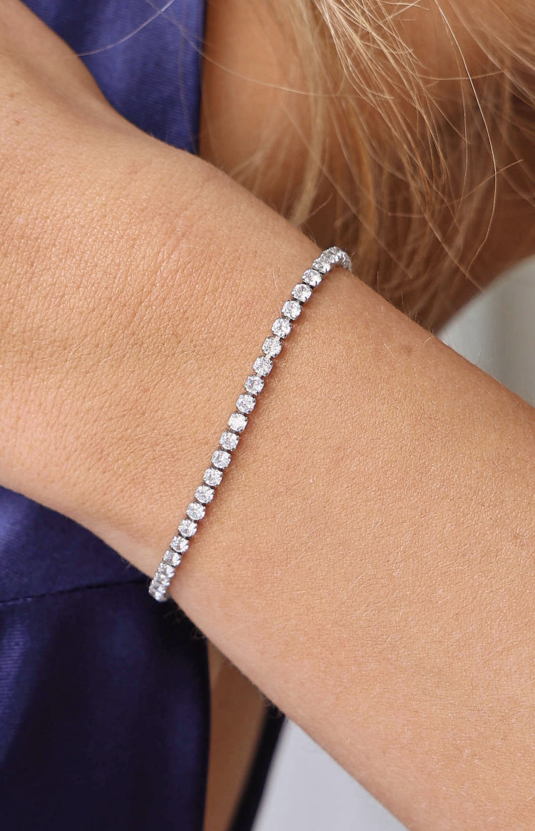 Close-up of the silver tennis bracelet highlighting the sparkle of each round diamante