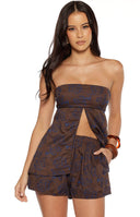 Brown floral shorts with elasticated waist, front patch pockets, and scalloped hem