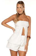 Beginning Boutique Ailany White Floral Strapless Longline Top white floral eyelet strapless longline top with front split and scalloped trim