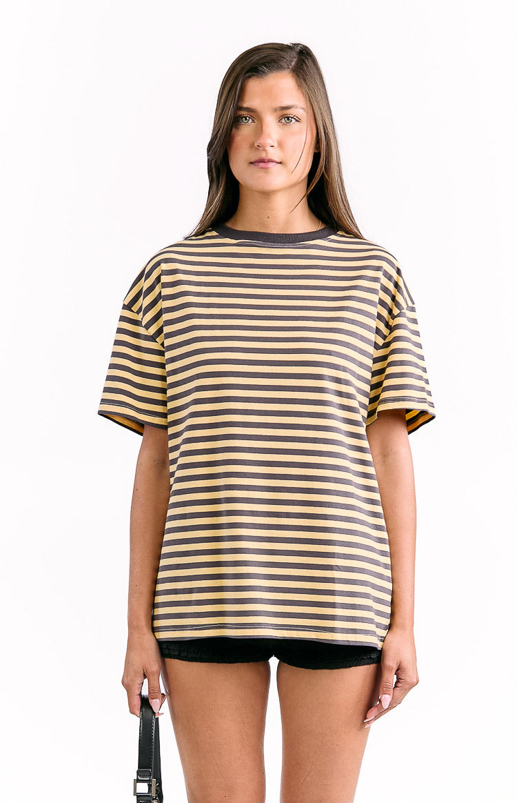 Full front view of a yellow and charcoal striped oversized tee with a dark ribbed crew neck