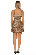 Rear view of a leopard print mini dress with thin spaghetti straps and a lace trim back neckline