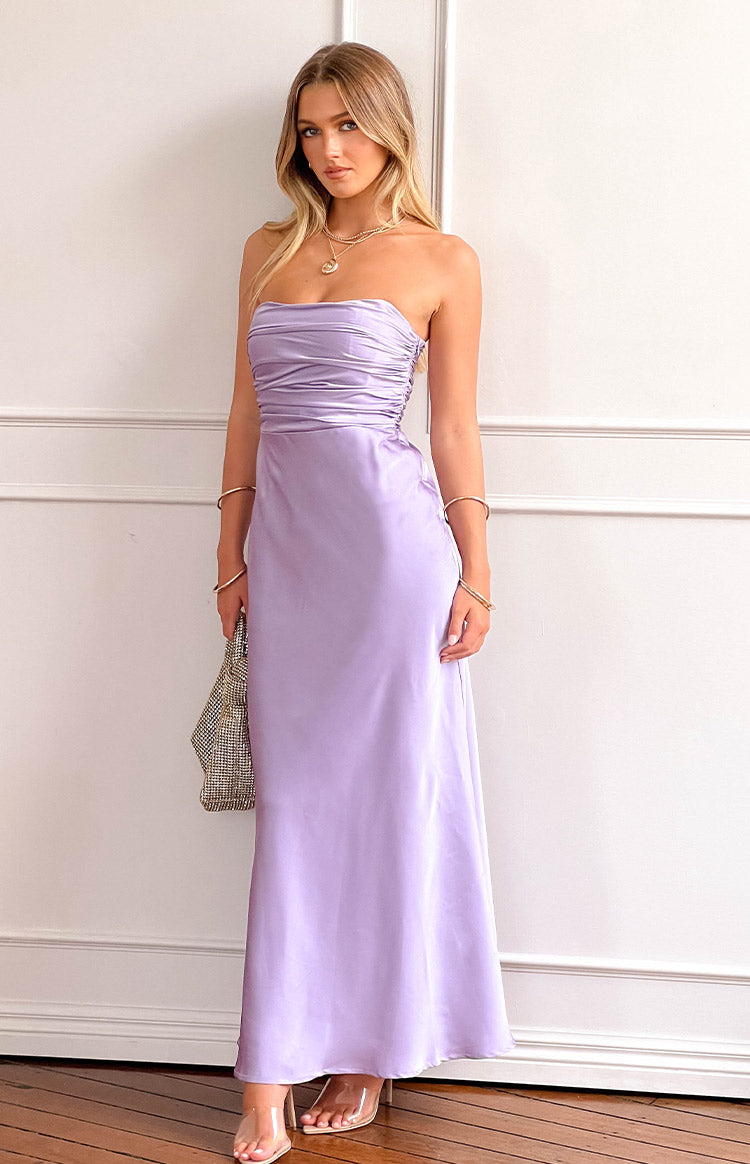Purple strapless maxi dress with a ruched bodice and a flowing satin skirt