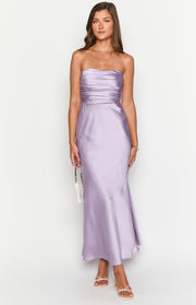 Purple strapless maxi dress with a ruched bodice and a flowing satin skirt