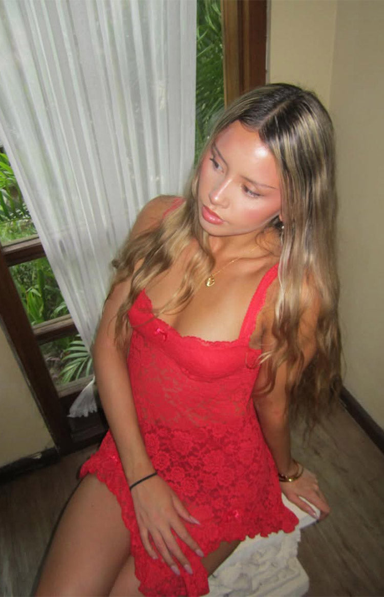 Beginning Boutique All Mine Red Lace Mini Dress red sheer lace mini dress with a square neckline, thin straps, small bow, and
