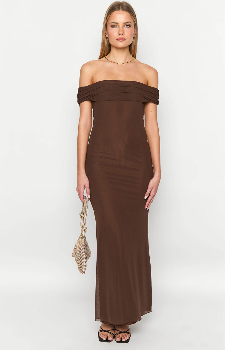 Front view of a brown off-shoulder maxi dress with a ruched neckline, ribbed knit body, and sheer overlay skirt