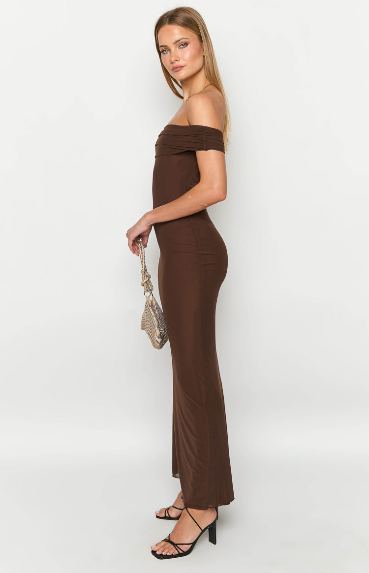Side view of a brown off-shoulder maxi dress with ruched detailing on the sleeves and a bodycon fit