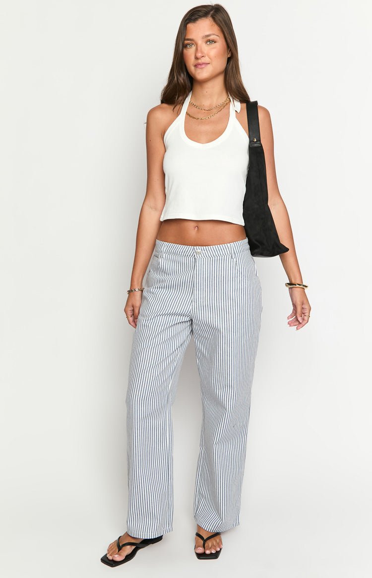 Full length view of navy and white vertical stripe mid-rise straight leg jeans