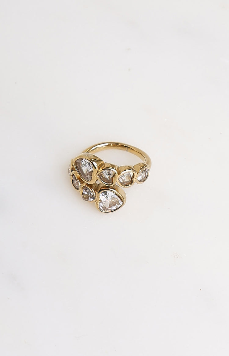 Beginning Boutique Amore Gold Heart Diamante Wrap Ring gold-toned ring with multiple clear heart-shaped diamantes in a wrap d