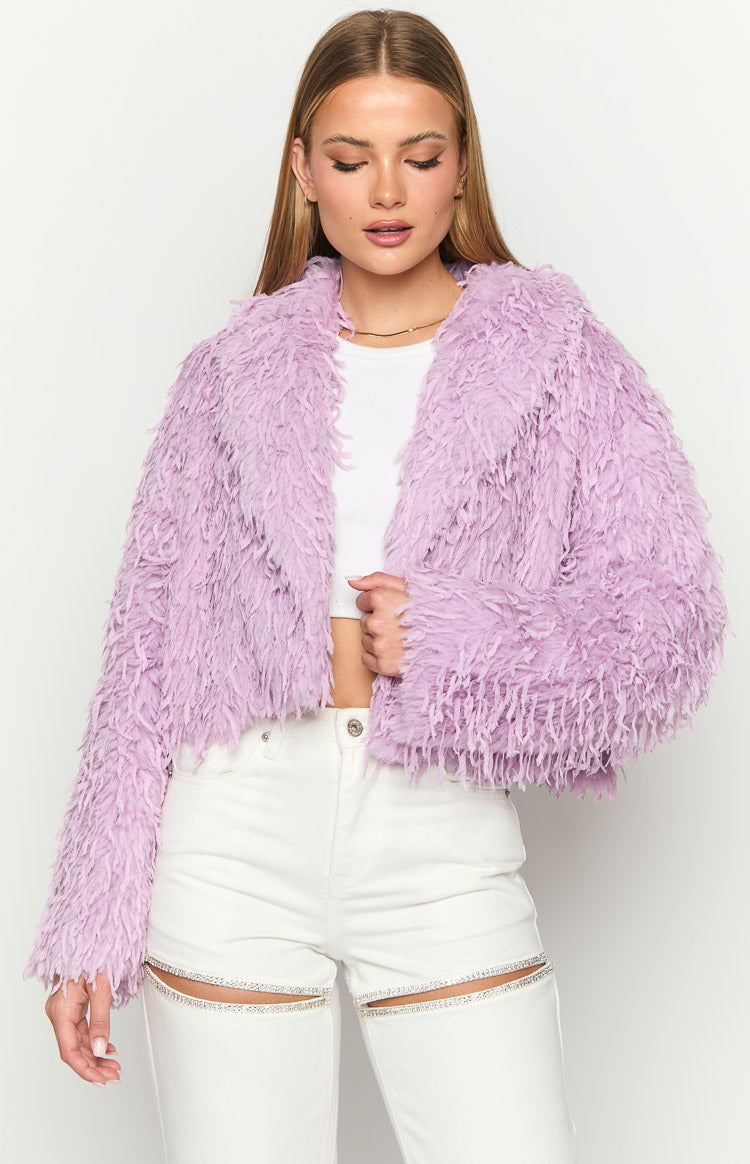 Purple cropped fringe jacket with shaggy texture, wide lapels, and an open front