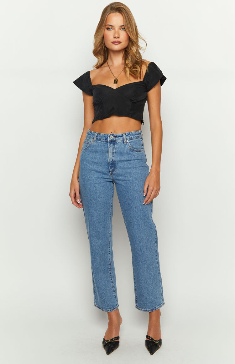 Black textured crop top with a sweetheart neckline and short puff sleeves