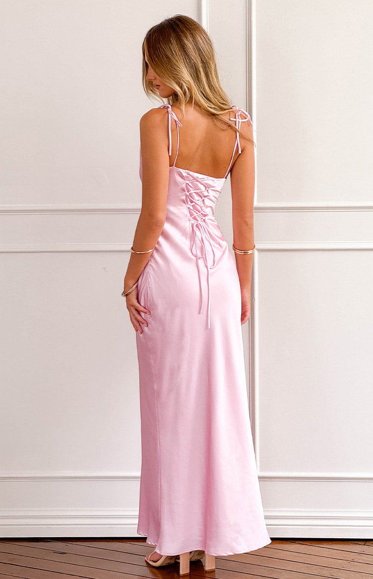 Rear view of a pink satin maxi dress with a lace-up corset back and tie spaghetti straps