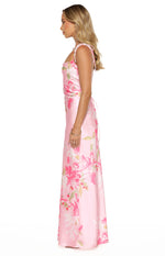 Side view of a pink floral maxi dress with a square neckline and delicate tie-up spaghetti straps