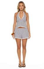 Blue and beige plaid shorts with a white lace trim along the hem and an elasticated waist
