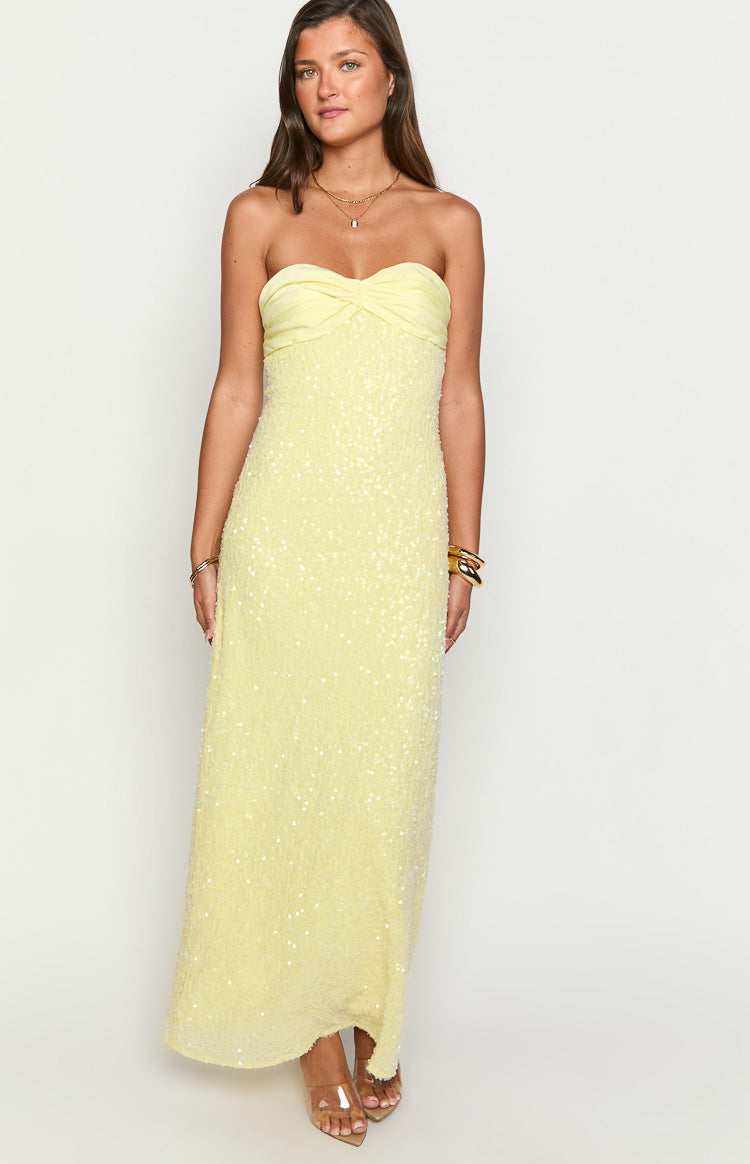 Yellow sequin strapless maxi dress with a twisted detail at the bust