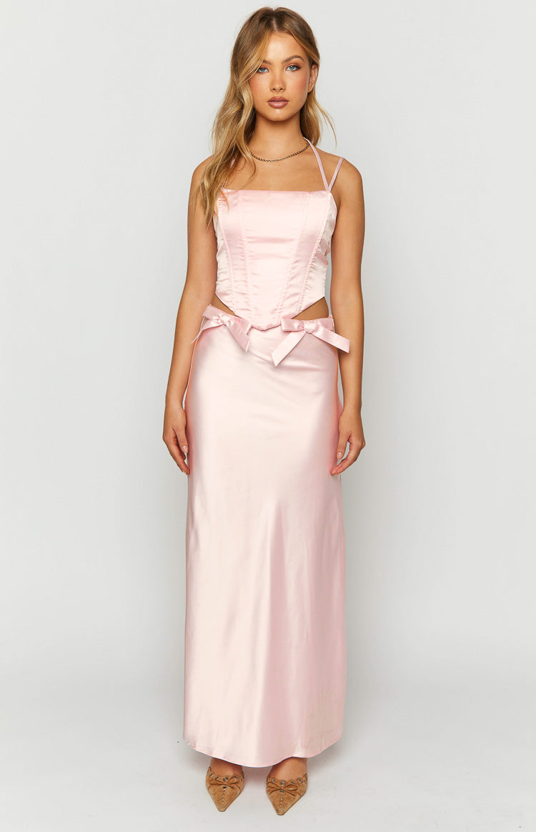 Front view of a pink satin corset top with a square neckline, thin straps, visible boning, and a pointed front hem