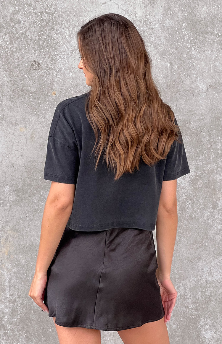 Washed black short sleeve tee, cropped length with a relaxed fit