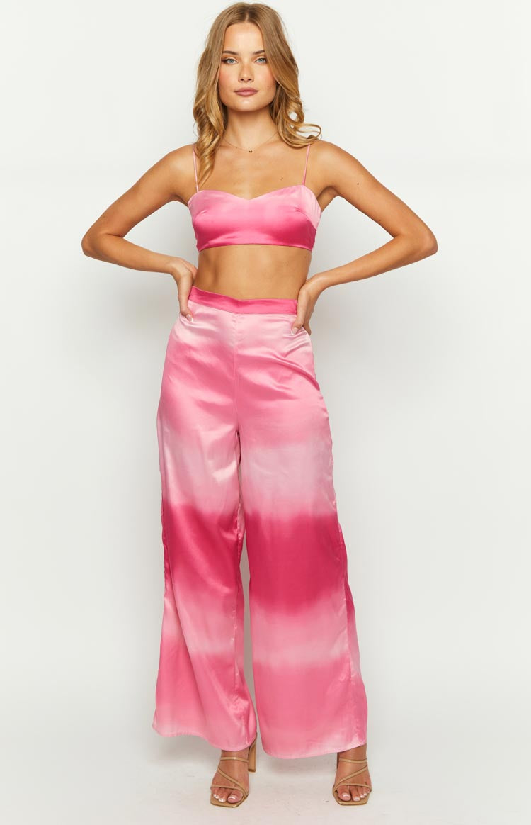 Bright pink satin crop top with a sweetheart neckline and thin spaghetti straps