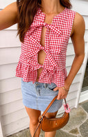 Beginning Boutique Baxter Red Gingham Top red gingham sleeveless top with multiple front ties and a peplum hem