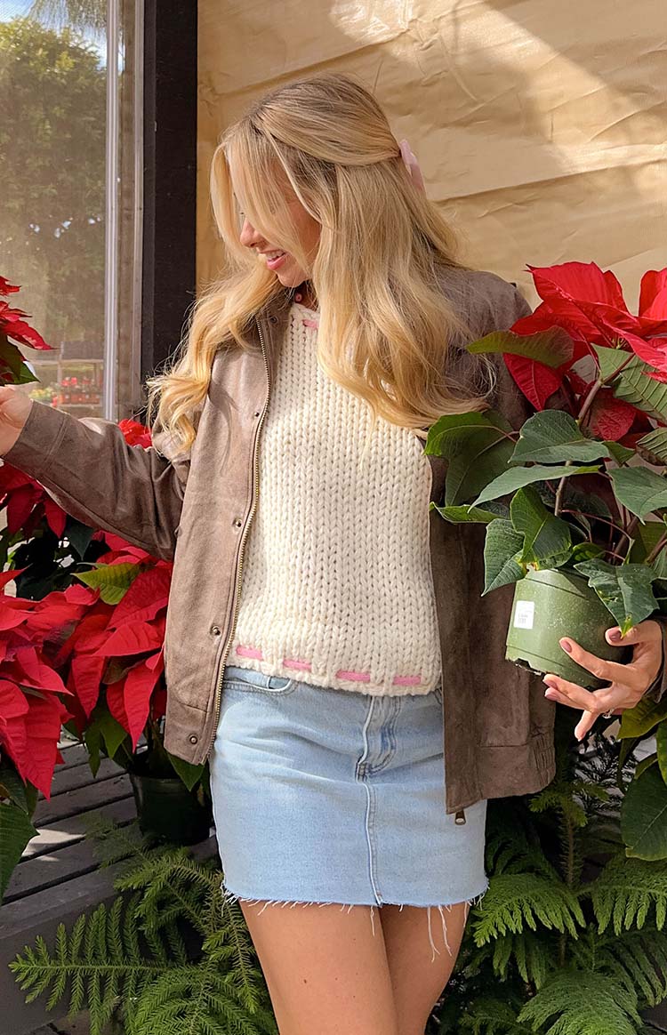 Beginning Boutique Bea Cream Sweater cream chunky knit sleeveless sweater with pink stitching detail at neck and hem
