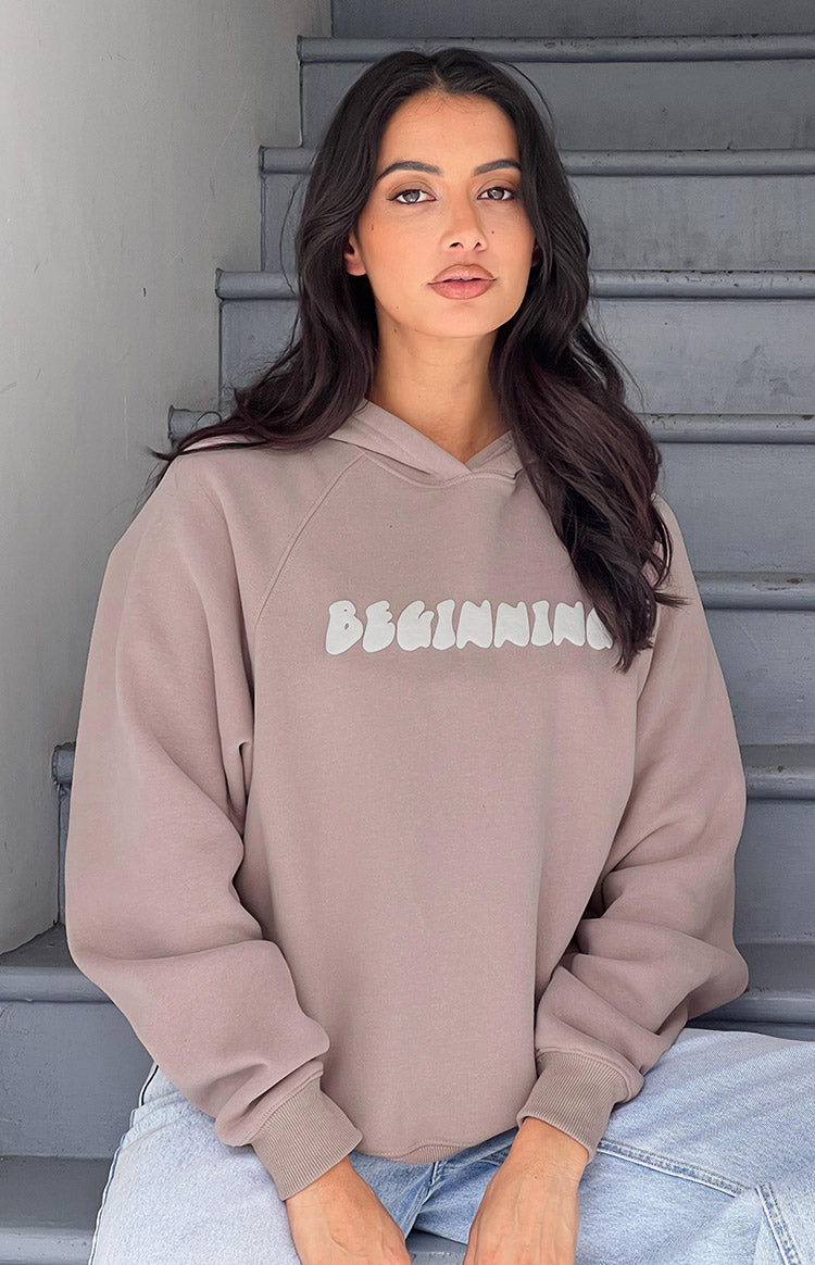 Beginning Boutique Beginning Beige Bubble Hoodie beige oversized hoodie with "BEGINNING" text on front, raglan sleeves and ribbed cuffs
