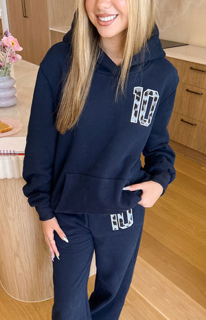 Navy hoodie with leopard print '10' on chest and matching navy track pants with leopard print 'BB' on thigh