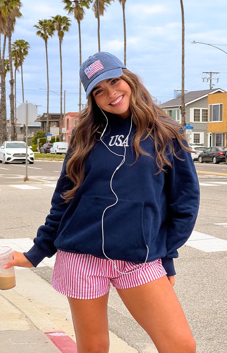 Front view of a navy hoodie with white 'USA' embroidery and a kangaroo pocket