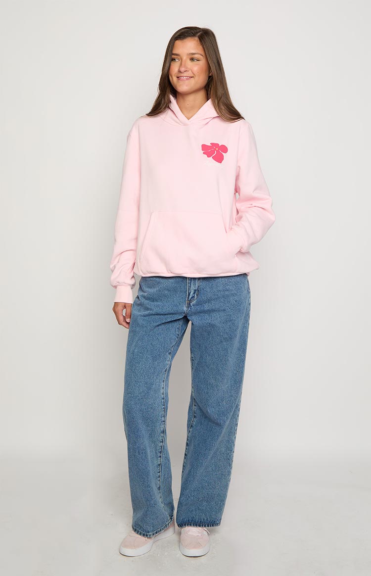 Pink hoodie with a bright pink hibiscus graphic on the chest and a large kangaroo pocket, relaxed fit