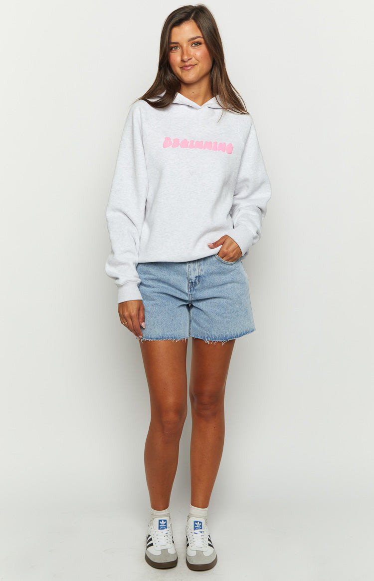 Front view of a grey marl cropped hoodie featuring a pink bubble text BEGINNING graphic