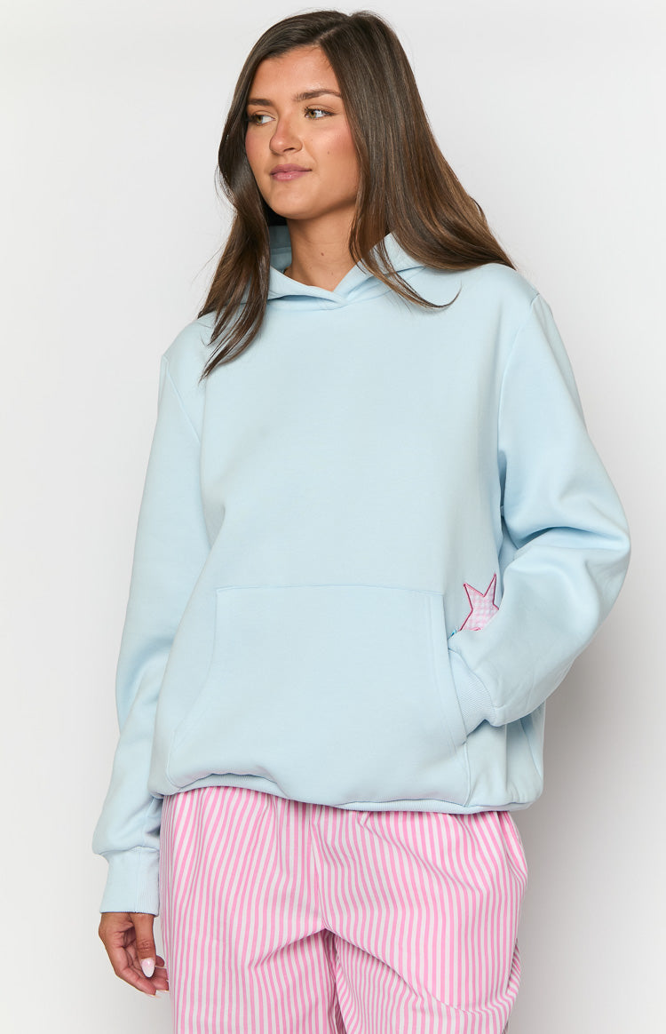 Beginning Boutique Beginning Light Blue Star Hoodie light blue relaxed fit hoodie with hood long sleeves kangaroo pocket and