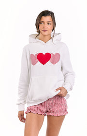 White hoodie with a central solid red heart applique and two red gingham hearts, and a front kangaroo pocket