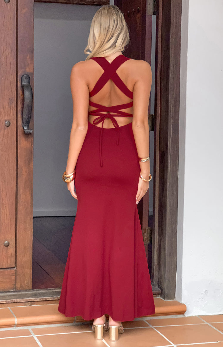 Rear view of a wine crepe maxi dress with criss-cross back straps and tie detail