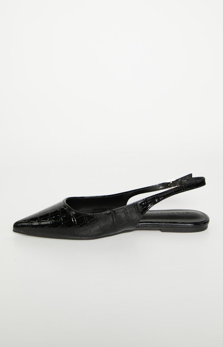 Side view of a black patent croc mule with a pointed toe and adjustable slingback strap