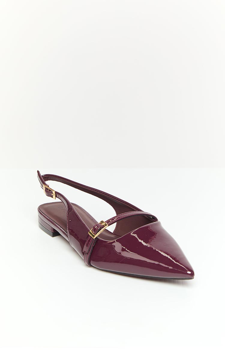 Side view of a mulberry patent mule with a pointed toe, slingback strap, and buckled vamp strap