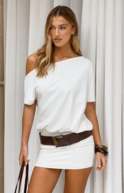 Beginning Boutique Bisou White Off Shoulder Mini Dress white off-shoulder mini dress with a relaxed blouson top and fitted sk