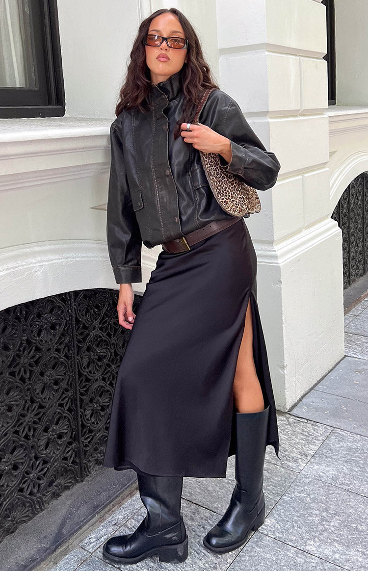 Brown PU jacket with a buttoned funnel neck, button-front closure, and flap chest pockets