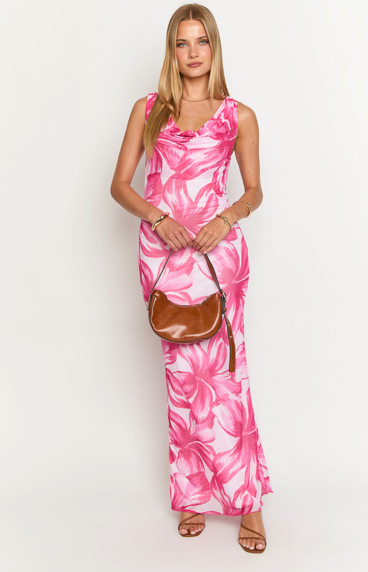 Front view of a pink floral maxi dress with a draped cowl neckline and sleeveless design