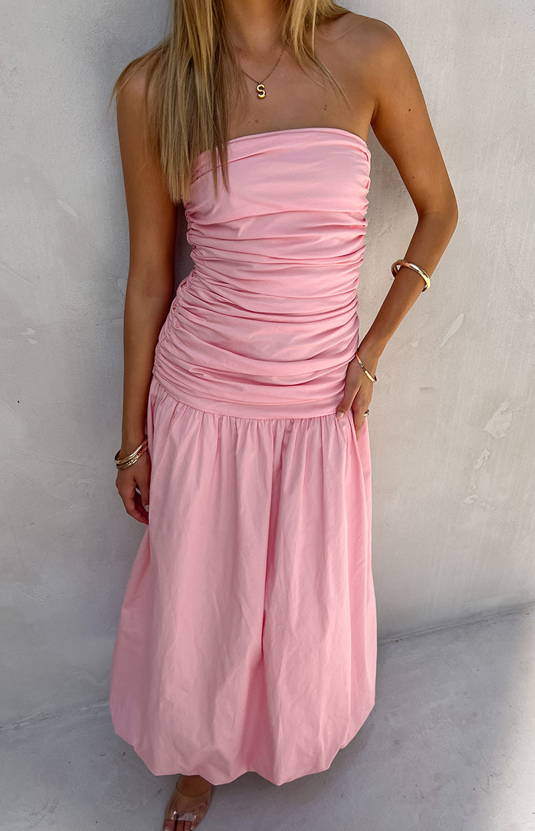 Close-up of the ruched pink strapless bodice and gathered bubble hem maxi skirt