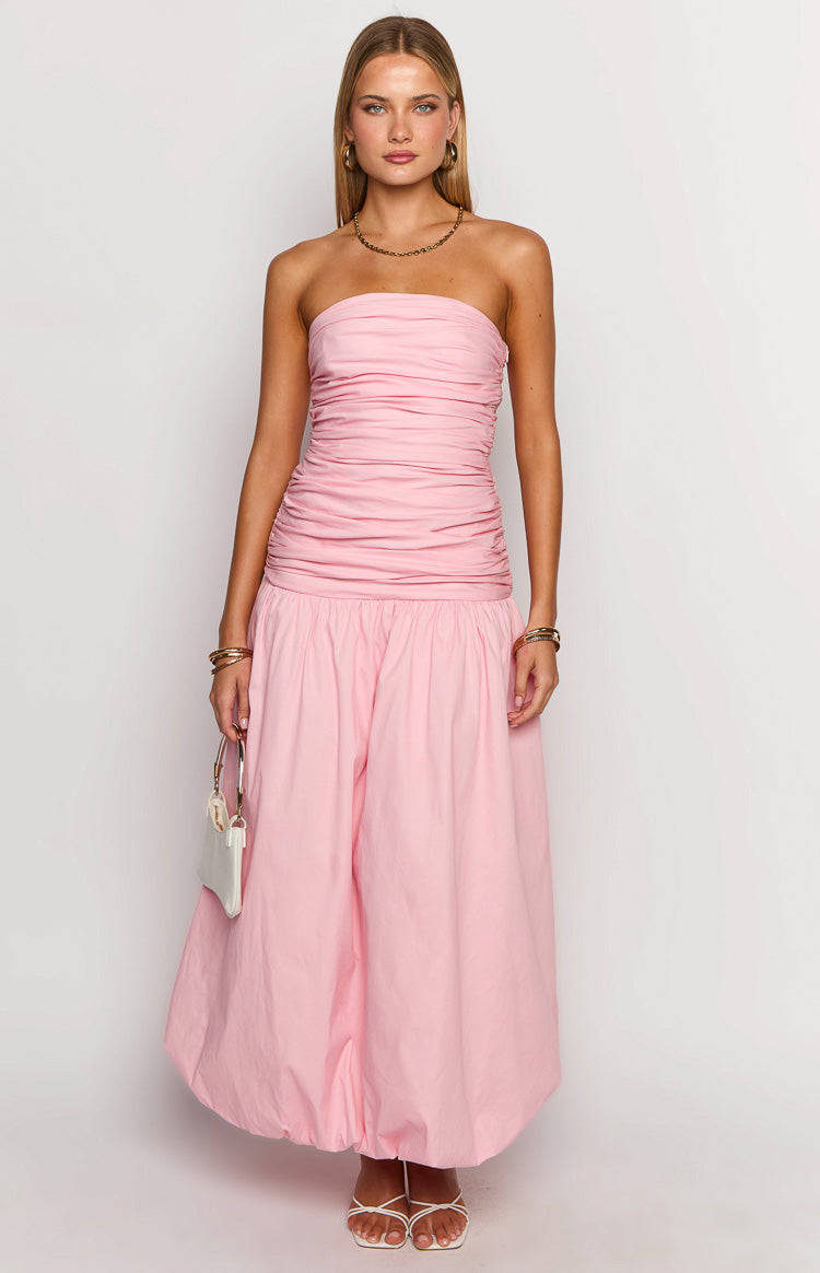 Strapless pink maxi dress with a ruched, fitted bust and a wide, gathered skirt with a bubble hem
