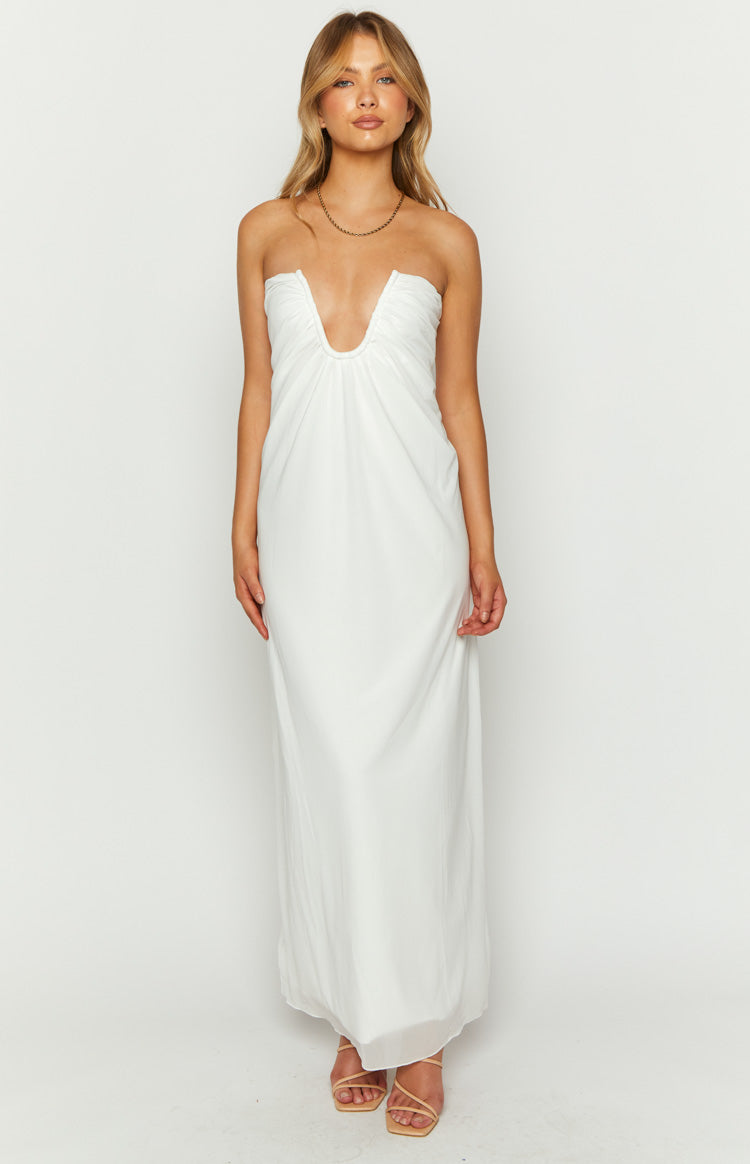 Front view of a white strapless maxi dress with a deep U-shaped neckline and ruched bust detail