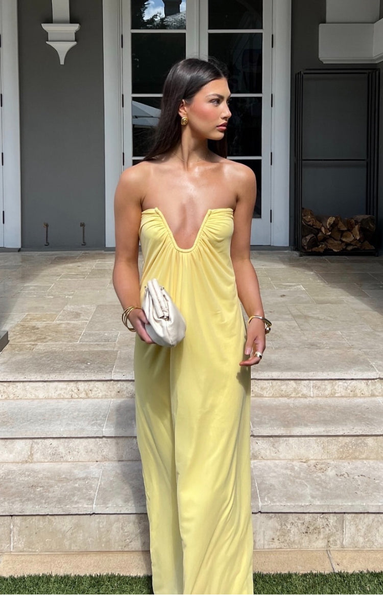 Yellow strapless maxi dress with a deep V-neckline and ruched bust detail
