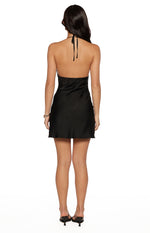 Back view of the black satin mini dress with a low open back and halter neck ties