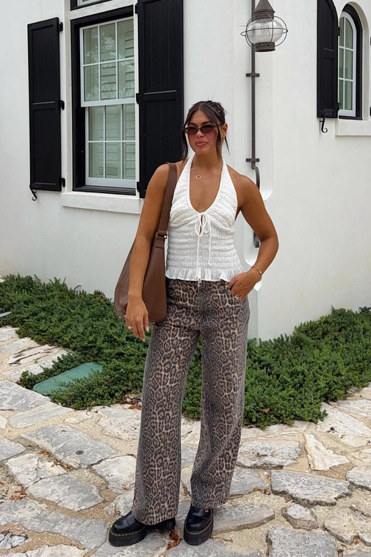 Brunet leopard print straight leg jeans showing the full length and relaxed drape