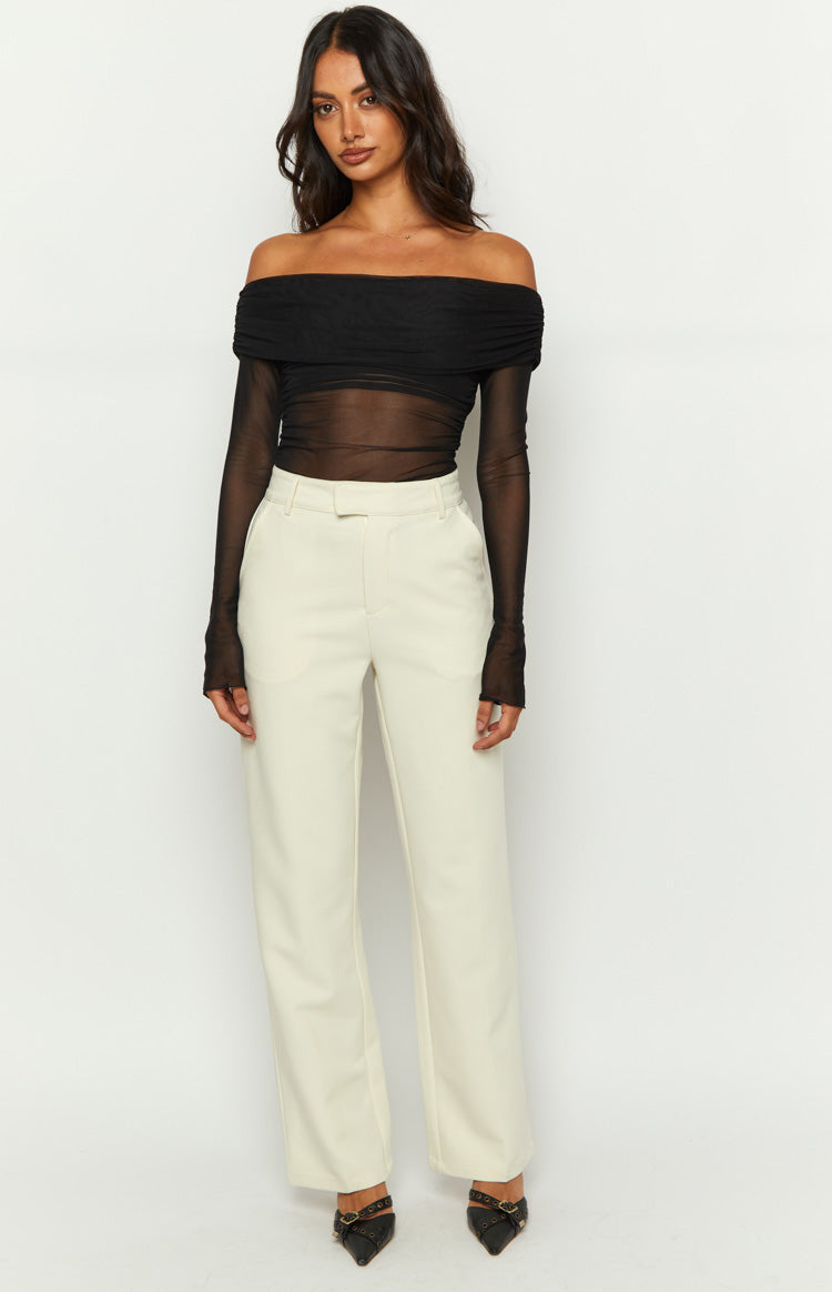 Cream straight leg high waisted tailored pants with belt loops and front pockets