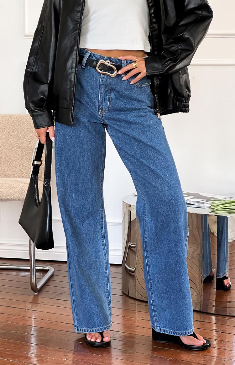 Beginning Boutique Calliope Mid Wash Mid Rise Slouchy Jeans mid wash blue denim mid rise slouchy wide leg jeans with button fly