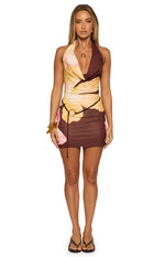 Brown, yellow, pink floral cowl neck mini dress with a thin black ring belt