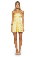 Front view of a yellow satin mini dress with a square neckline and pleated bodice